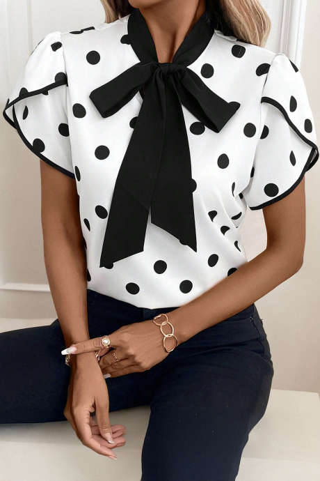 Črna bluza s pikčastim potiskom in kontrastnimi rokavi z pentljo