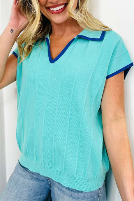 Turkizna dvignjena rebrasta pletena polo majica s kontrastnim robom