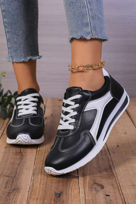 Mustat kuntosalin muotiväriset PU-nahkaiset lenkkarit