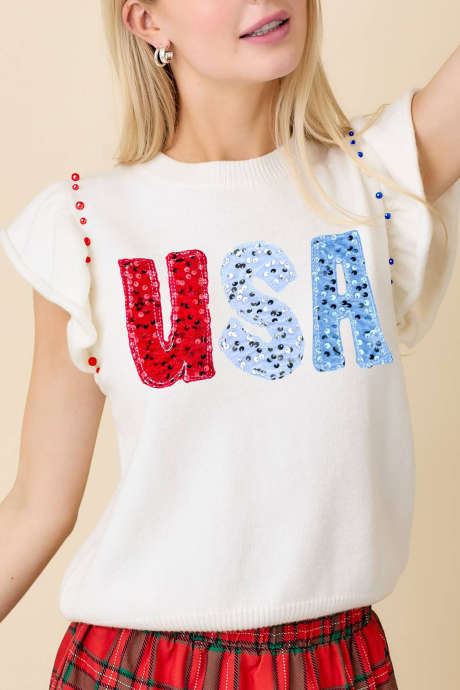Bela pletena majica s kratkimi rokavi in ​​bleščicami ter grafiko napisov ZDA