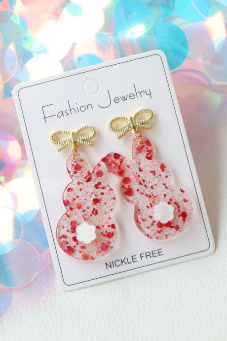 Tulisenpunaiset kirkkaat pääsiäispupun rusettikorvakorut