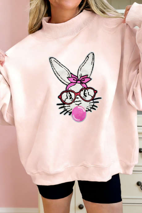 Marelično roza pulover z zajčkom iz ženiljske gume