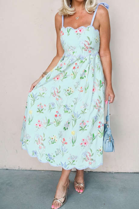 Nebesno modra midi obleka s cvetličnim potiskom in kontrastnimi obrobami, visokim pasom in zavezovanjem
