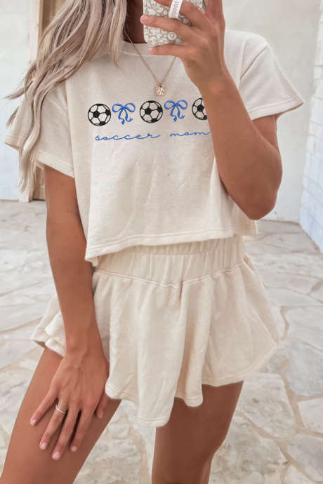 Komplet 2 kosov krila z visokim pasom in vezenim nogometnim pentljo, bež barvo