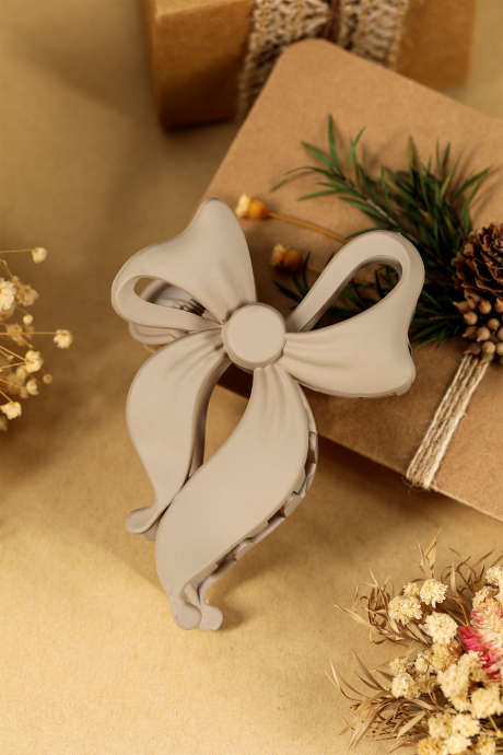 Sponka za lase s pergamentnim sladkim trakom in pentljo