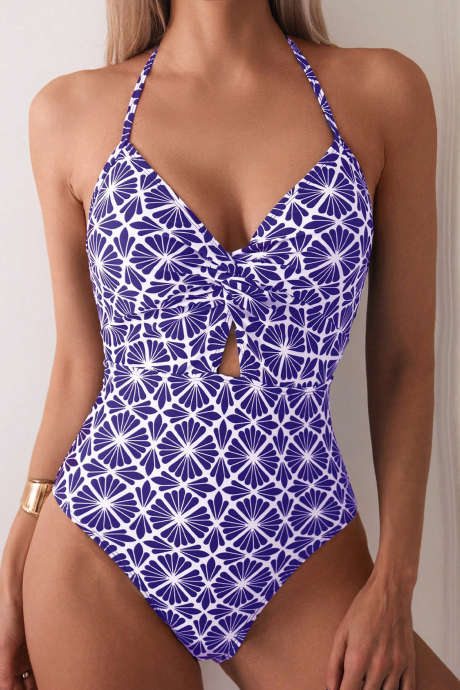 Vijolične kopalke z abstraktnim cvetličnim potiskom in izrezom na vratu