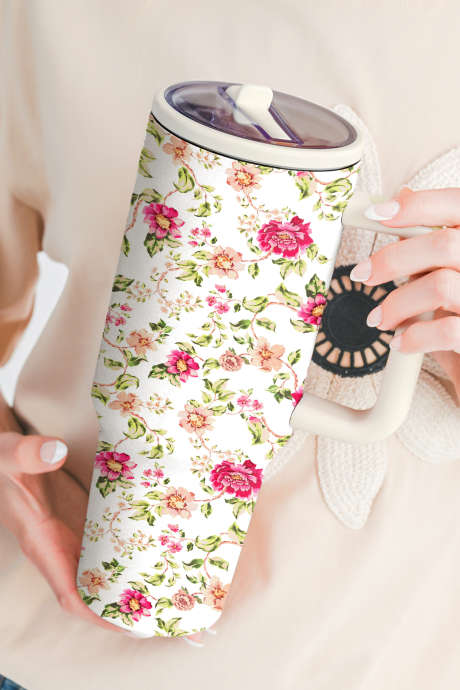 Hvit Dream Floral-glass med sidehåndtak og sugerør