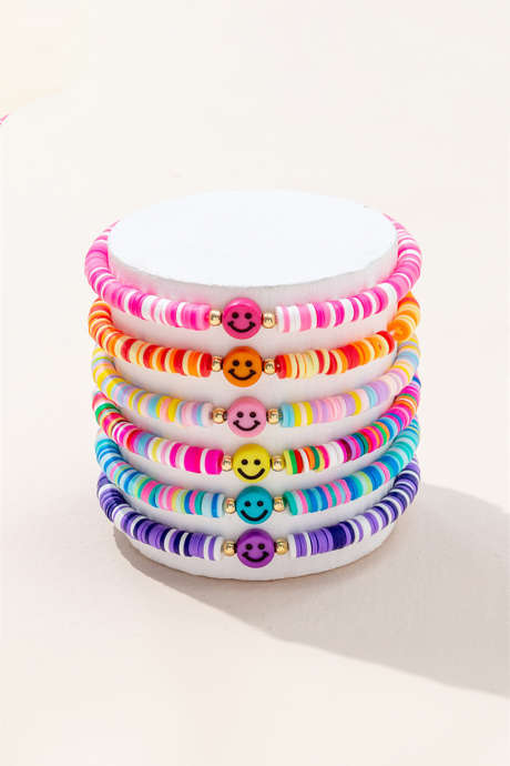 Sada 6 pružných náramků z polymerové hmoty s motivem úsměvu a zářivě růžové barvy BH014823-P106