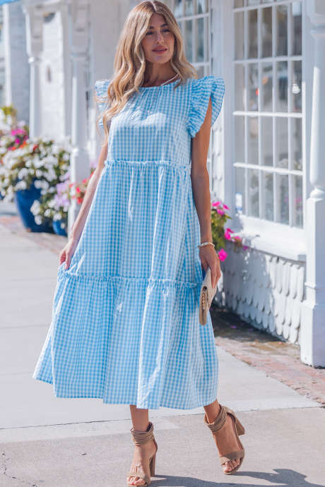 Himmelblå knuterygg med rysjer og korte ermer i gingham-stil