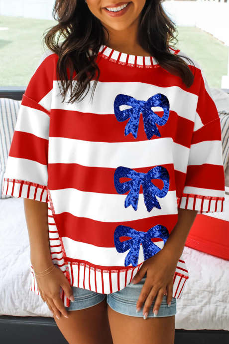 Červený pruhovaný top s flitrovou mašlí a vlasteneckým potiskem