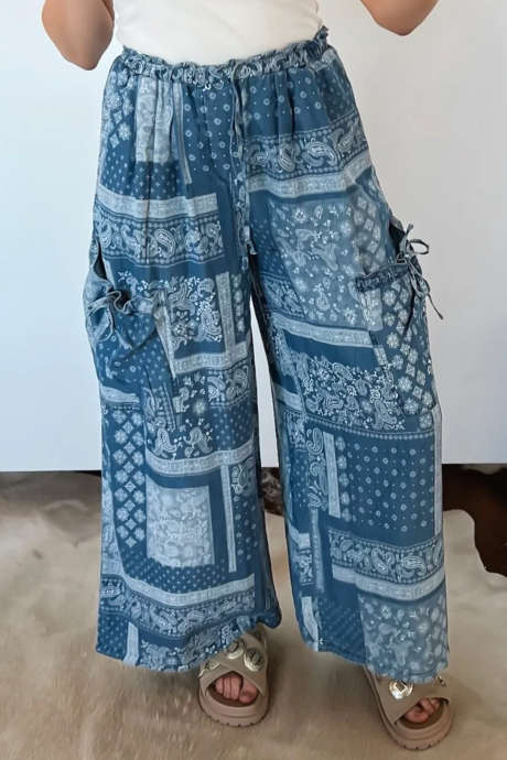 Blå paisley-jeans med blandet trykk og snøring og lommer