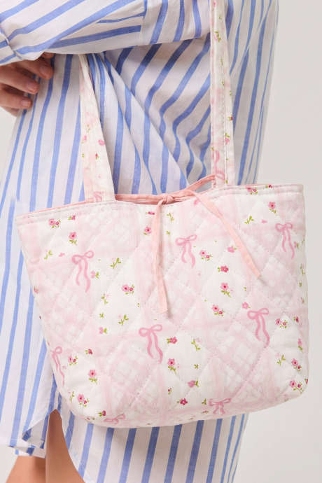 Bolsa de algodão acolchoada com estampa floral rosa e laços