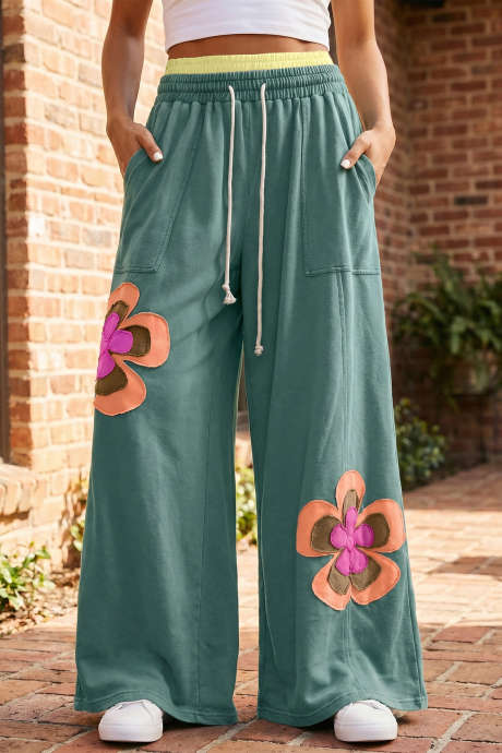 Pantalones anchos con cintura elástica en contraste y cordón ajustable con diseño de patchwork de flores en color verde mar