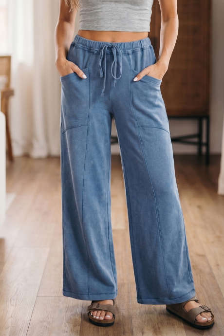 Pantalon western rétro bleu Ashleigh, délavé à cordon de serrage, taille haute et jambes larges.