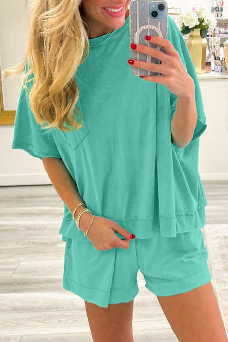 Conjunto de top e shorts oversized verde menta com bolsos aplicados e barra desfiada