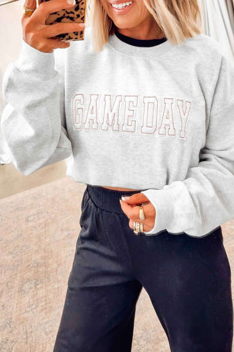 Sudadera informal gris claro con estampado de letras y hombros caídos