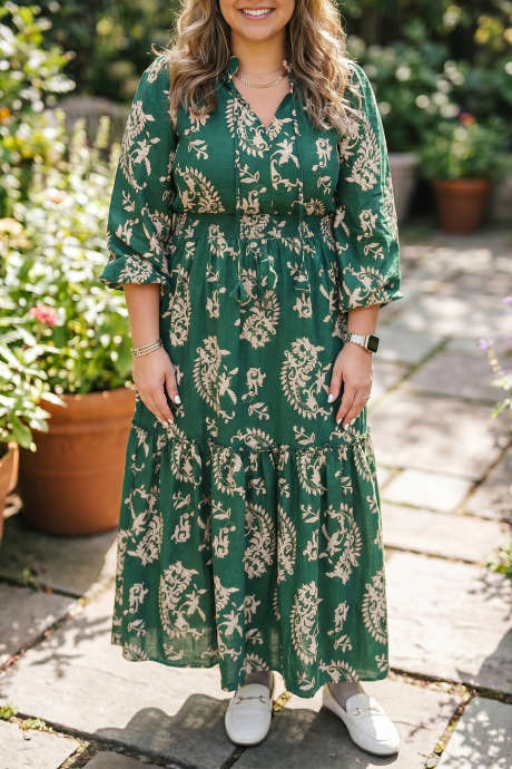 Robe décontractée à imprimé floral vert, col en V et manches longues.
