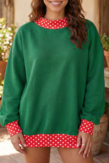 Felpa oversize a blocchi di colore verde scuro con pois e bordi a contrasto.