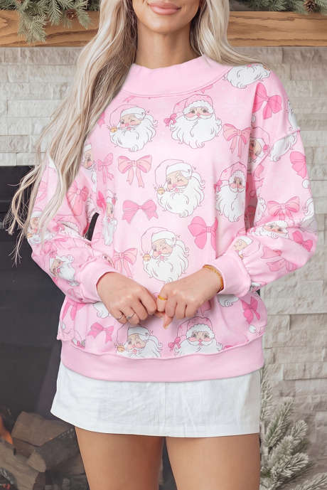 Sudadera rosa con estampado abstracto de Papá Noel, hombros caídos y cuello alto.