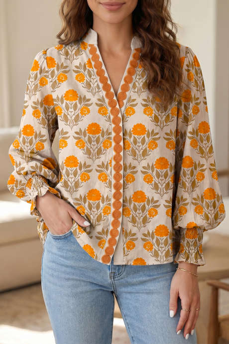 Langarmshirt mit orangefarbenem Blumenmuster, V-Ausschnitt