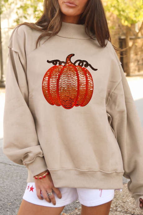 Sweatshirt longgar berkerah tinggi bergambar labu berpayet warna aprikot