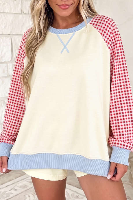 Áo nỉ tay raglan phối màu kẻ caro màu be, kiểu dáng pull-over.