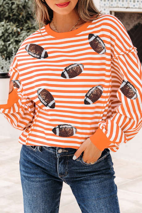 Oranje gestreepte top met pailletten en rugbyprint, losse pasvorm, lange mouwen en rafelige naden.