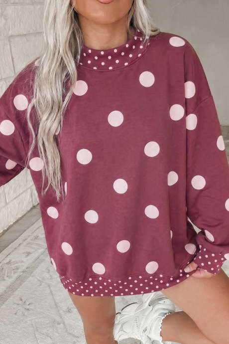 Oversize-Tunika-Sweatshirt mit rotem Polka-Dot-Print und kontrastierenden Details