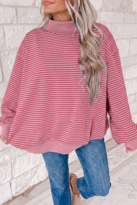 Moletom oversized com gola alta, canelado e com blocos de cores em tons de rosa