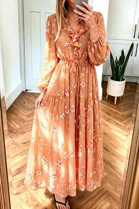 Robe maxi fluide à imprimé floral orange, manches longues transparentes, col à volants et cordon de serrage