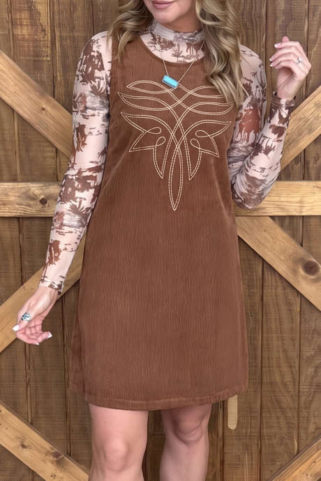 Mouwloze corduroy jurk met geometrische koffieborduursels