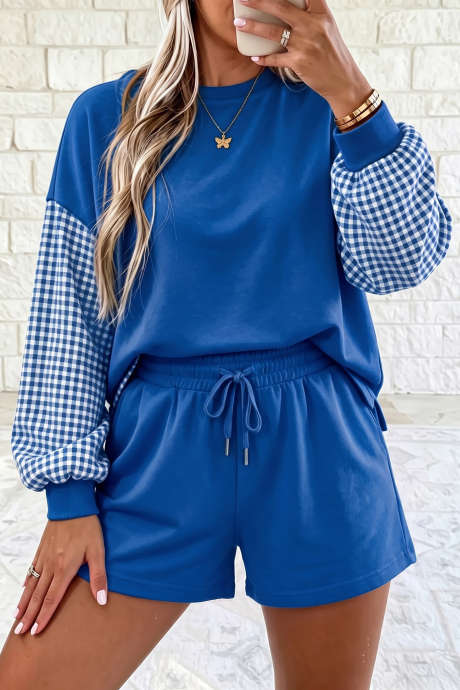 Ensemble haut à carreaux bleus patchwork à manches longues et short à cordon.