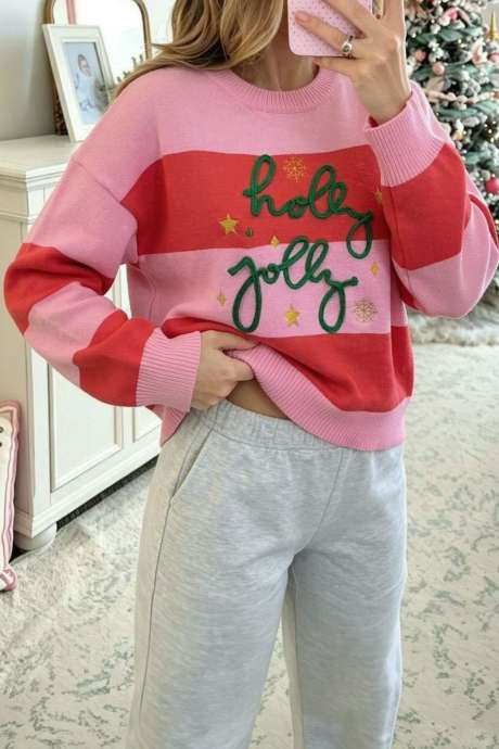Pull de Noël à rayures roses et sequins