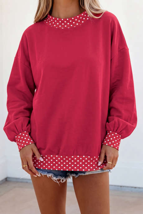 Oversized sweatshirt met rode dahlia-kleurblokken en stippen, contrasterende bies.