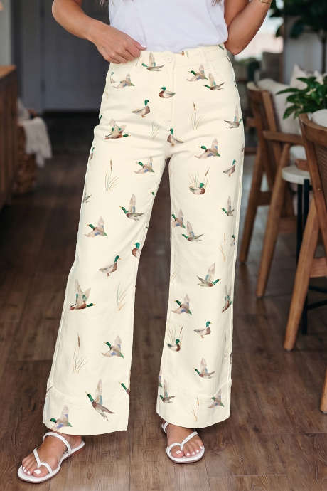 Beige snygga Mallard-tryckta shiftjeans med mudd och fåll