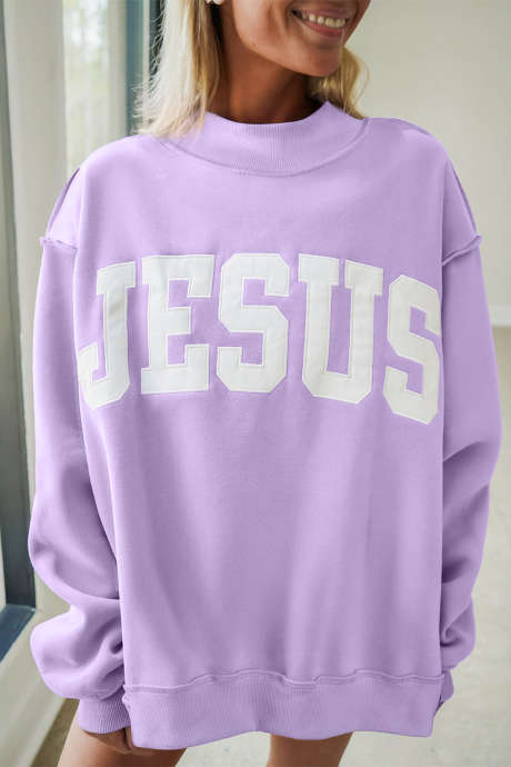 Sweat-shirt ample à col montant et coutures apparentes, orné d'un écusson «&nbsp;Jésus&nbsp;» et d'un bouquet d'orchidées