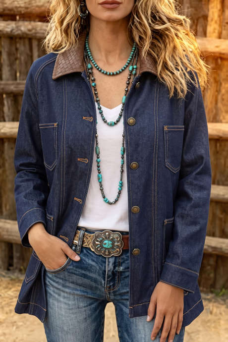 Veste en jean bleu marine à col contrastant, détails de surpiqûres et boutons