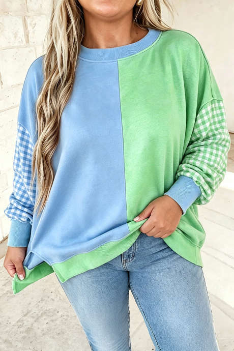 Sudadera moderna de talla grande con mangas a cuadros y bloques de color azul claro.