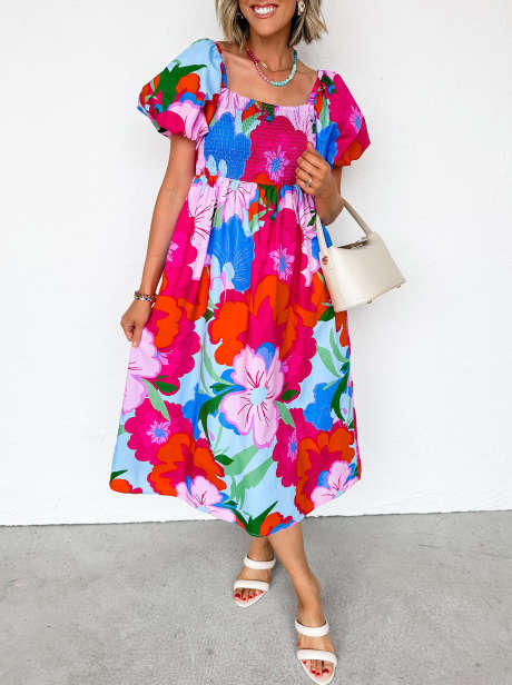 Vestido midi multicolor con estampado floral, mangas abullonadas y fruncido.