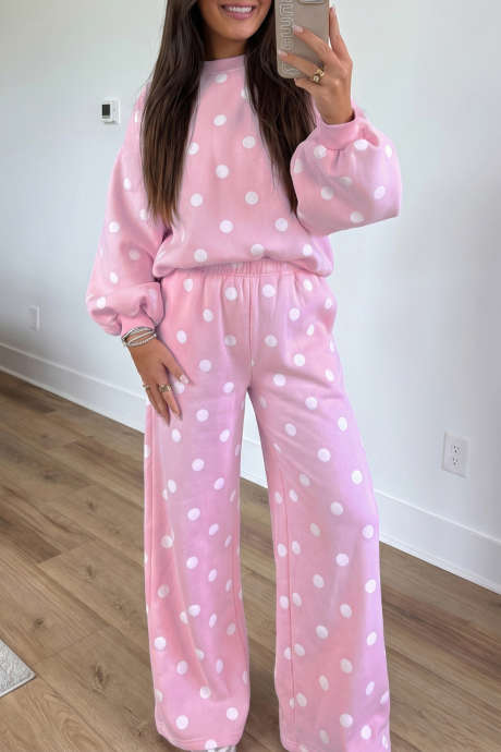 Conjunto de 2 piezas: top rosa de manga abullonada y pantalón informal.